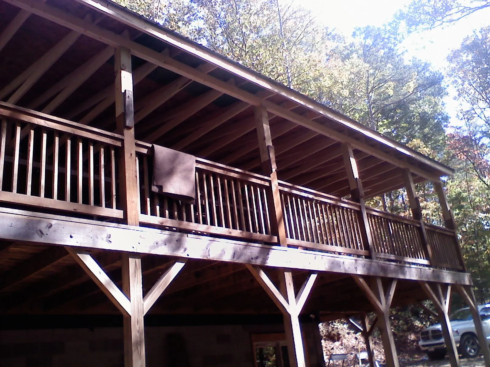 Timber framing under a new elevated porch and deck — Roof Leak Repair in Ardsley by Roofing Brothers